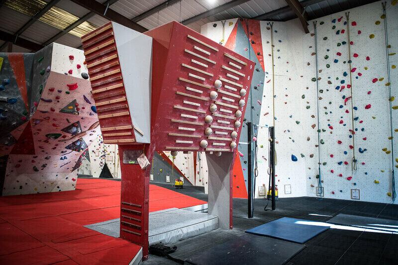 Training area with fingerboards, weights and lattice aids at Indy